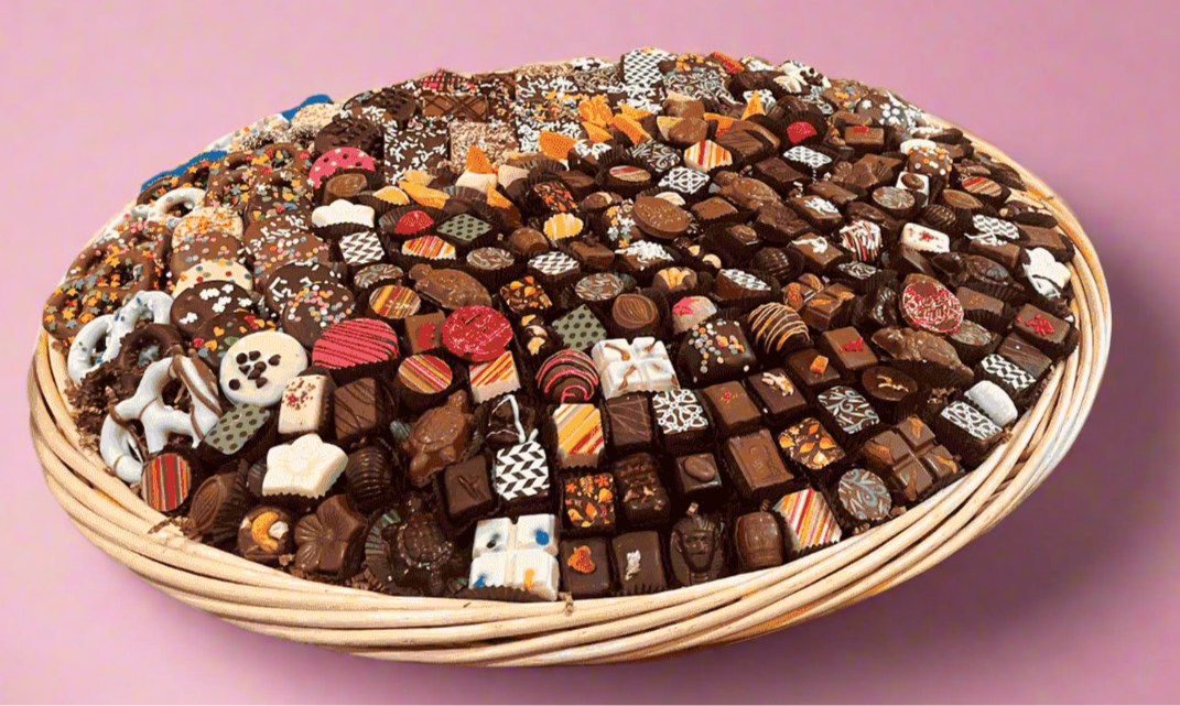 SUPREME - Congratulations gourmet chocolate gift basket filled with assorted artisan chocolates, ideal for celebratory gifting occasions.