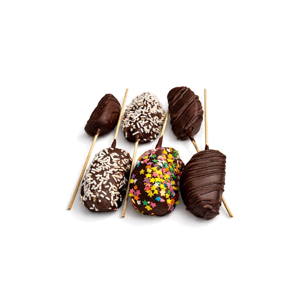 Six chocolate-dipped apple slices on sticks, kosher Rosh Hashanah treat