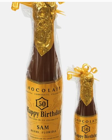 Personalized chocolate champagne bottles with gold foil tops made for a milestone birthday in Miami