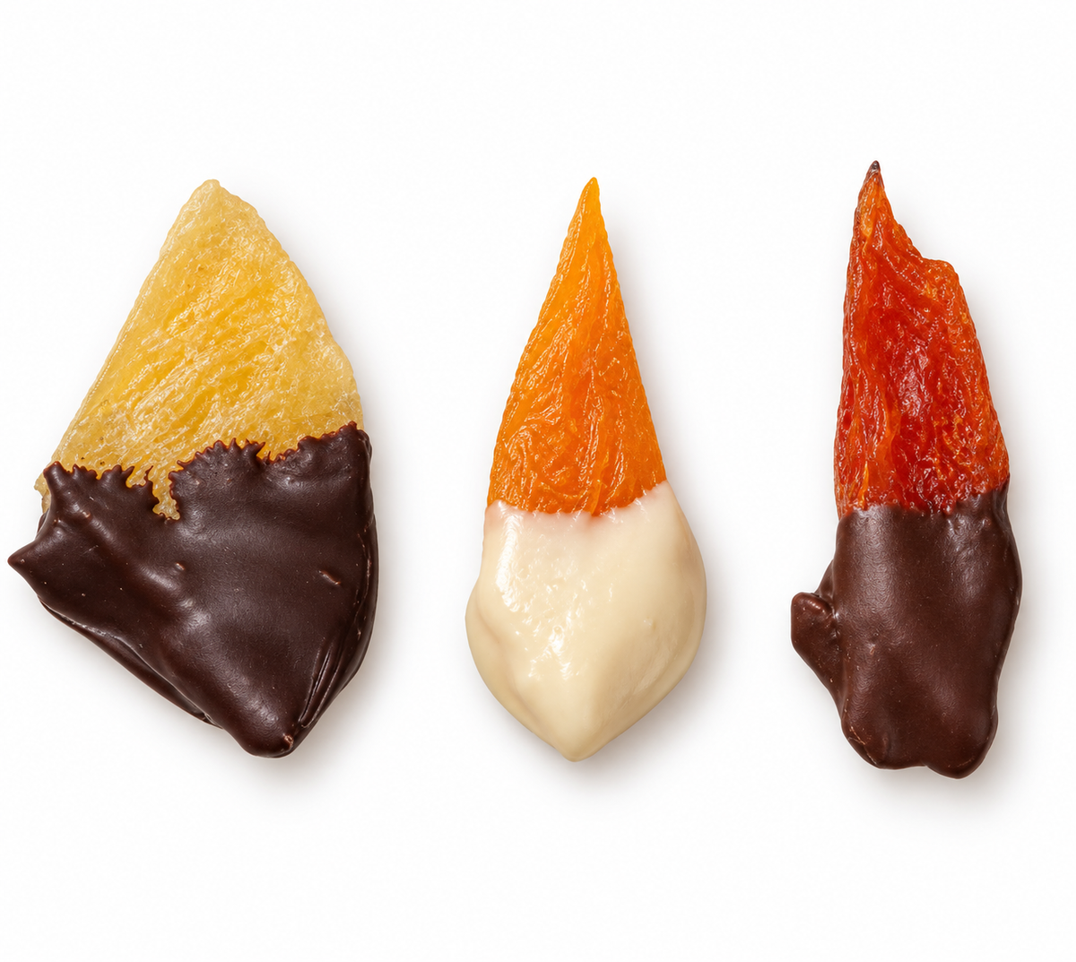 Three pieces of dried fruit half dipped in dark, white and milk chocolate from The Sweet Tooth