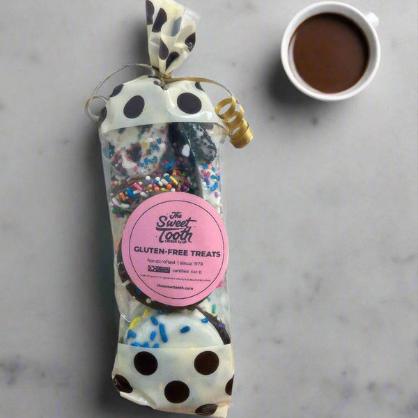 Packaged gluten-free treats with polka dot design on a white background