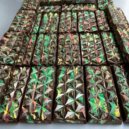 Multiple Passover Dubai Chocolate Bars arranged in a grid, featuring vibrant marbled tops ideal for kosher Passover celebrations.