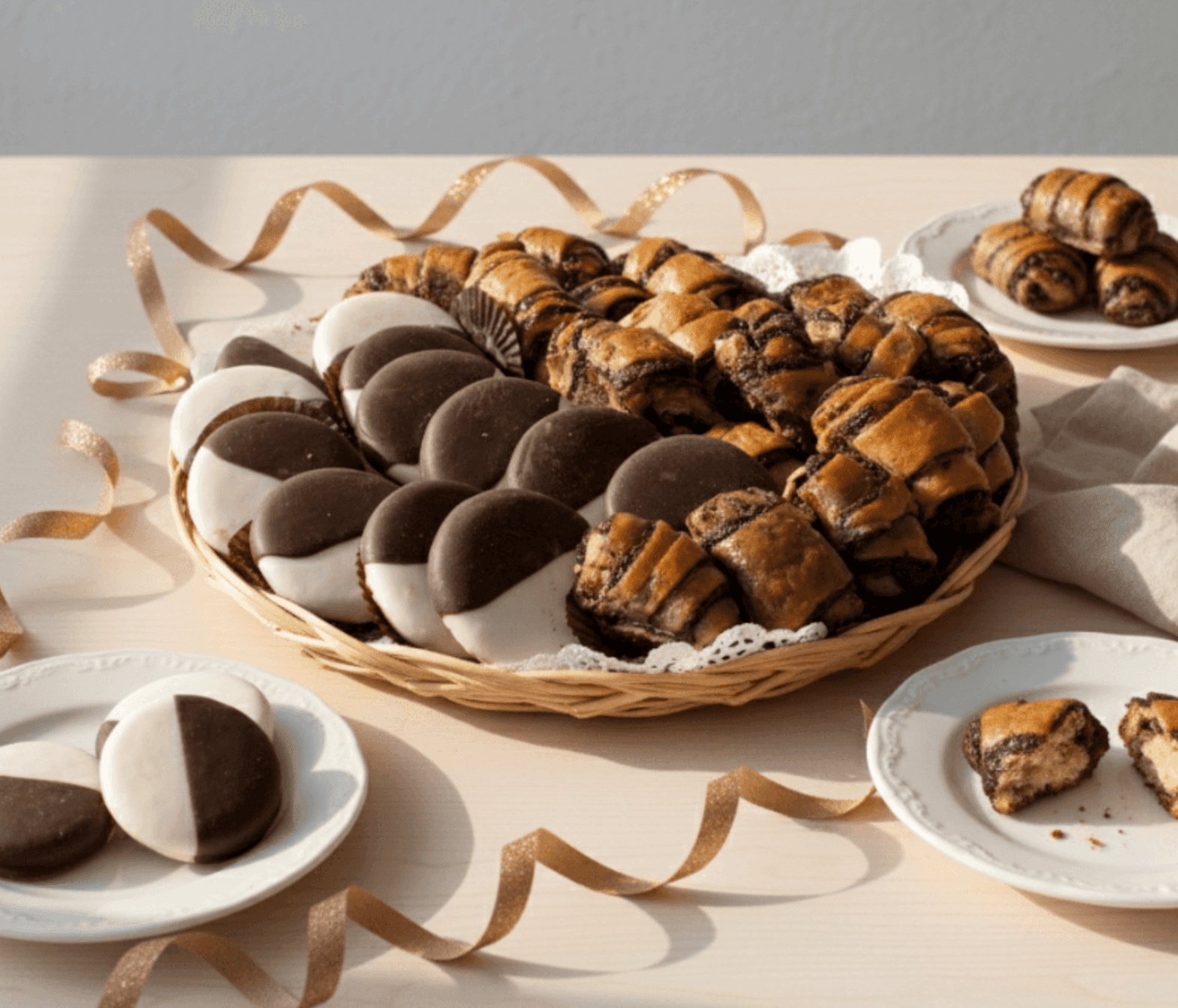 a delicious platter of chocolate  rugullach and black and white kosher cookies