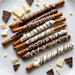 Chocolate-dipped pretzel rods with white and dark chocolate swirls, ideal for snack foods or festive gifting occasions.
