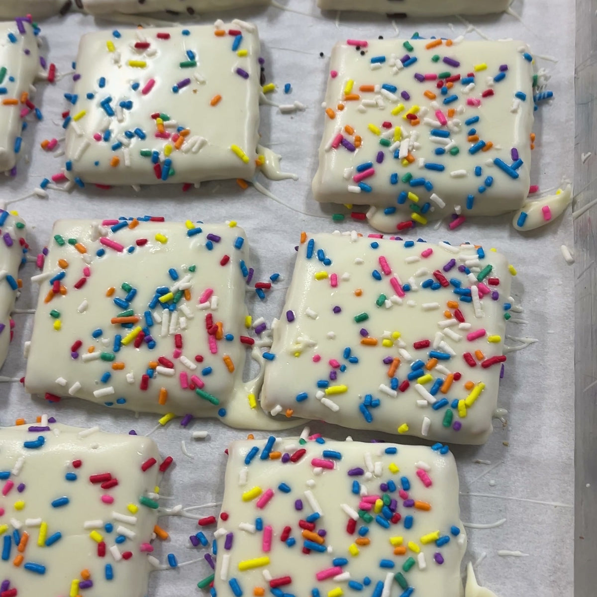 Chocolate covered graham crackers with sprinkles from The Sweet Tooth