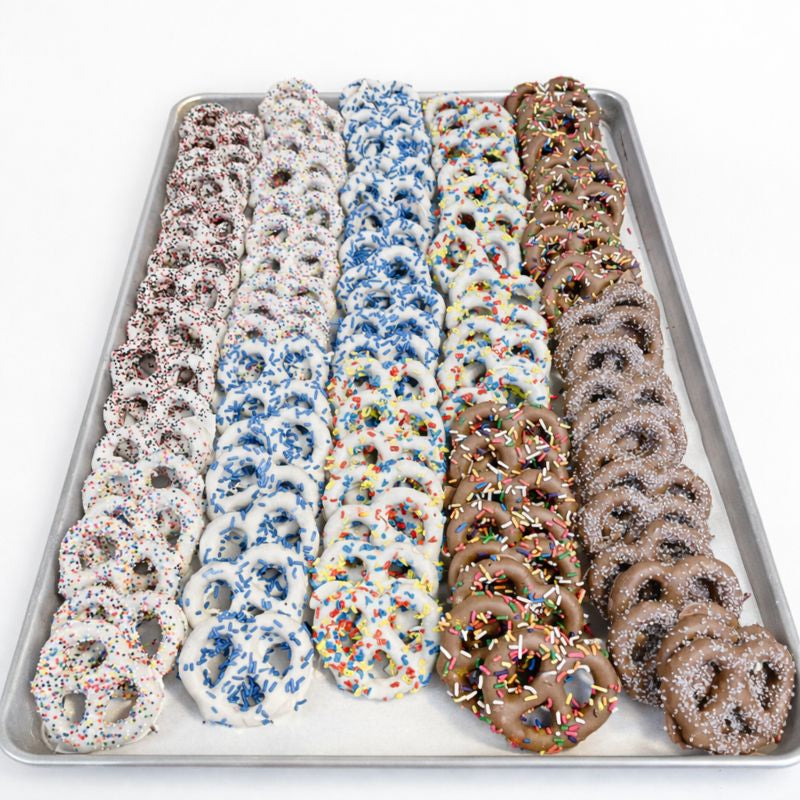 Chocolate dipped pretzels with assorted sprinkle toppings The Sweet Tooth North Miami Beach since 1979