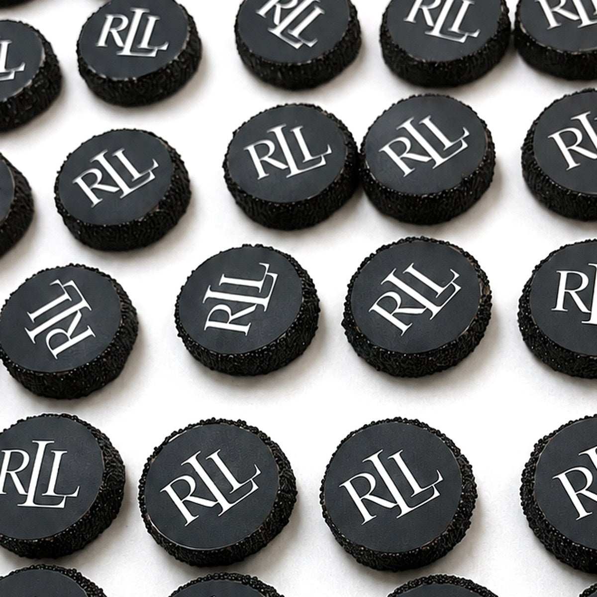 Chocolate dipped Oreos printed with a custom monogram logo